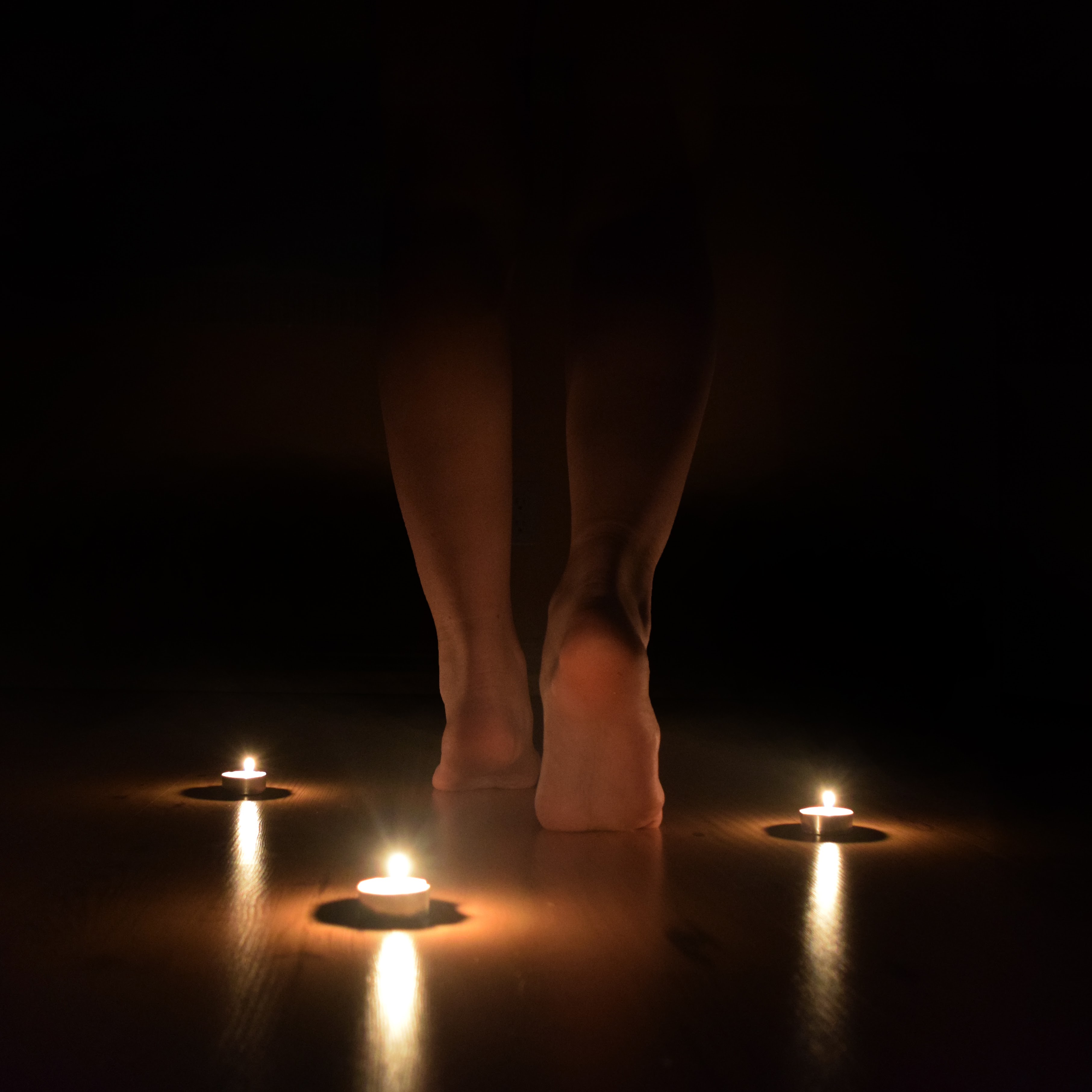 For this shot I made the shadows much deeper using Photoshop, I wanted the candlelight to shine and a feeling of wandering into the unknown. I really should've given attention to the outlet still showing in the middle, breaking the illusion when you get a closer look. 